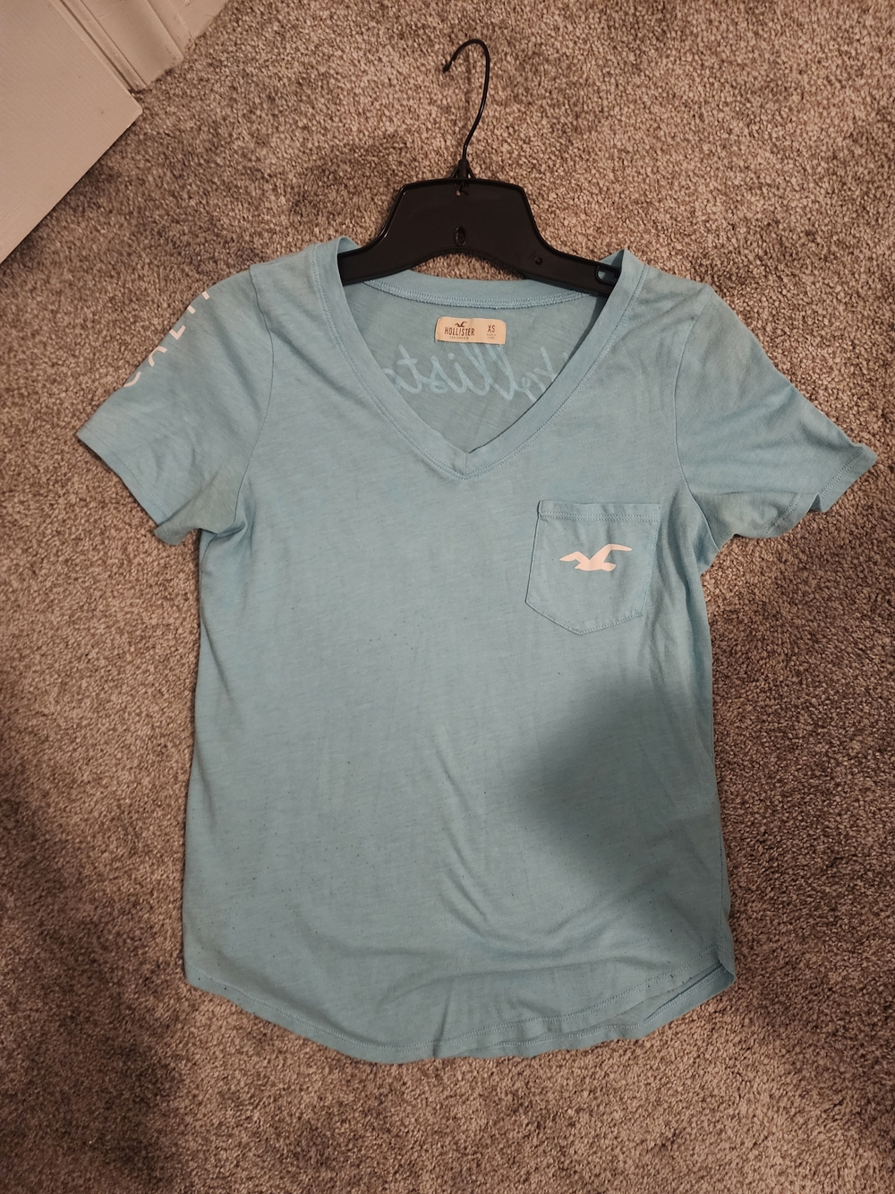 Hollister Women's Light Blue V-Neck Pocket T-Shirt